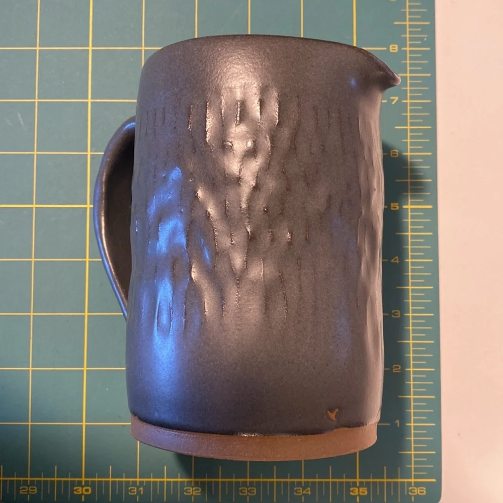 Beautiful hand thrown pitcher.